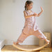 Kinderfeets Wooden Wobble Kinderboard Natural Girl Posing