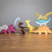 Tender Leaf Toys 8 Wooden Dinosaurs Table