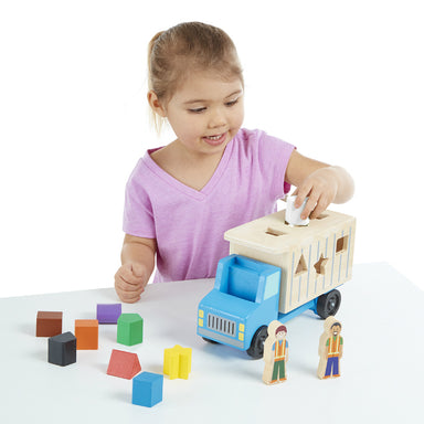 Melissa & Doug Shape Sorting Dump Truck Girl Playing